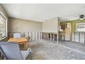 Renovation project showcasing the open space between the kitchen and living area before improvements at 123 14Th Ave, Indian Rocks Beach, FL 33785