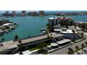 Breathtaking water views from this condo overlooking the marina, docks, and nearby buildings at 400 Island Way # 1402, Clearwater Beach, FL 33767
