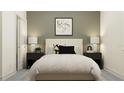 Cozy bedroom featuring neutral walls, stylish bedside lamps, and comfortable decor at 7541 E 116Th St, Palmetto, FL 34221