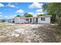 Charming single-story home featuring a front yard and attached garage at 11130 White Oak Ln, Port Richey, FL 34668
