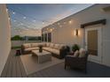 Cozy rooftop patio area featuring comfortable outdoor seating, string lights, and a peaceful ambiance at 1330 W Gray St # 1, Tampa, FL 33606