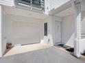 This home features a one car garage with direct home access at 320 Island Way # 205, Clearwater Beach, FL 33767