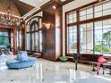 Spacious lobby area with grand piano, high ceilings, and elegant seating at 345 Bayshore Blvd # 1813, Tampa, FL 33606