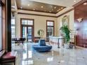 Expansive lobby featuring a reception desk, comfortable seating and piano at 345 Bayshore Blvd # 1813, Tampa, FL 33606
