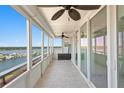 Enjoy panoramic water views from this tiled condo balcony at 17920 Gulf Blvd # 1806, Redington Shores, FL 33708