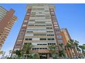 A full exterior view showcases the building's height and balcony design at 17920 Gulf Blvd # 1806, Redington Shores, FL 33708
