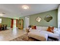 Bright living room featuring fresh paint, modern furniture, and natural light at 2750 Edenwood St, Clearwater, FL 33759