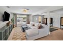 Bright living room with large window, comfortable seating, and stylish decor at 504 7Th Sw Ave, Largo, FL 33770