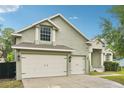 Charming home featuring a convenient two-car garage and well-maintained landscaping at 707 9Th Sw Ave, Ruskin, FL 33570