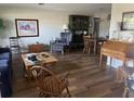 Cozy and inviting living space with hardwood floors and an open floor plan at 13000 90Th Ave, Seminole, FL 33776