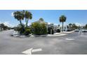 Well-maintained single-story home with lush landscaping, offering a serene and inviting curb appeal at 4851 W Gandy Blvd # B7L23, Tampa, FL 33611