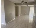 Spacious living room featuring tile floors and natural light at 116 Cranbrooke Dr, Seffner, FL 33584