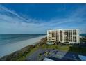 Stunning beachfront condo with balcony and pool access, steps away from a pristine sandy beach and the ocean at 1480 Gulf Blvd # 905, Clearwater Beach, FL 33767