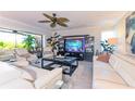 Living room with white furniture and modern decor with sliders to the outside at 2335 Beneva Ter # 2254, Sarasota, FL 34232