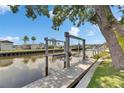 Private boat lift providing direct access to the waterfront and convenient boating opportunities at 6532 Simone Shores Cir, Apollo Beach, FL 33572