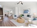 Inviting living room with hardwood floors, modern furnishings, and ample natural light at 851 6Th S Ave, St Petersburg, FL 33701