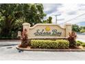 Decorative Solana Bay community entrance sign surrounded by manicured landscaping at 8568 Sandy Beach St, Tampa, FL 33634