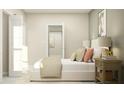 Relaxing bedroom with soft colors, stylish furniture, and lots of natural light at 11083 E 65Th Ter, Palmetto, FL 34221