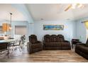 Open-concept living room, featuring stylish floors and comfortable seating at 5860 War Admiral Dr, Wesley Chapel, FL 33544