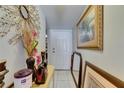 Bright entryway with neutral walls and tiled floor, creating an inviting and clean welcome space at 9481 Highland Oak Dr # 1511, Tampa, FL 33647