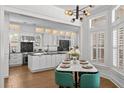 Modern, updated kitchen with marble countertops, stainless steel appliances, and bright lighting at 2603 Sanders Dr, Tampa, FL 33611
