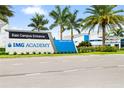 East Campus Entrance signage featuring palm trees and modern architecture providing a welcoming gateway to IMG Academy at 3702 54Th W Dr # 104, Bradenton, FL 34210