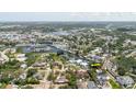 Aerial shot showcasing the waterfront property's location near a harbor and its proximity to a canal system at 216 High St, Tarpon Springs, FL 34689