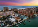 Beautiful aerial view of waterfront condos, a sandy beach, and the Gulf at 479 E Shore Dr # 5, Clearwater, FL 33767
