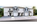 The building features modern architecture and a well-manicured lawn, offering a comfortable living environment at 5110 Captain Davis Dr, Wimauma, FL 33598
