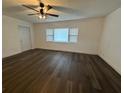 Bright living room with hard flooring and ceiling fan at 7631 43Rd St N, Pinellas Park, FL 33781
