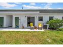 A cozy back patio with seating is perfect for relaxation and outdoor enjoyment at 7850 40Th N Ave # 7850, St Petersburg, FL 33709