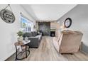 Inviting living area featuring stylish furnishings and a decorative barn door accent wall at 7850 40Th N Ave # 7850, St Petersburg, FL 33709