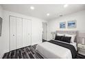 Cozy bedroom with a closet and calming decor at 1119 Eau Claire Cir, Tampa, FL 33619