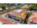 Lovely two-story townhome featuring a private garage and balconies with charming neighborhood views at 21007 Sunpoint Way # 203, Lutz, FL 33558