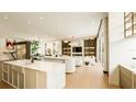 Open concept with great natural light, modern fixtures, kitchen islands and living area at 4103 W Knights Ave, Tampa, FL 33611