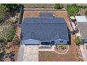 Aerial view of a single Gathering home, fenced backyard, and driveway at 6137 Halifax Dr, New Port Richey, FL 34653