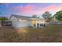 Cozy backyard with a covered patio perfect for outdoor entertaining at 6137 Halifax Dr, New Port Richey, FL 34653
