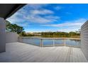 Relax on this spacious deck with calming lake views that provide the perfect outdoor escape at 13635 Twin Lakes Ln # 13635, Tampa, FL 33618