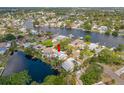 Scenic aerial view showcases the home's proximity to the waterfront and beautiful backyard at 320 Tallahassee Ne Dr, St Petersburg, FL 33702
