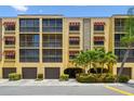 Well maintained condominium building with covered parking and lush tropical plants at 5817 Park N St # 310, St Petersburg, FL 33709