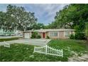 Charming single-story home with a well-maintained lawn and inviting curb appeal at 6345 Lambert Ln, New Port Richey, FL 34652