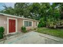 Charming single-story home with a well-maintained lawn and inviting curb appeal at 6345 Lambert Ln, New Port Richey, FL 34652