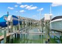 Private boat dock with lifts, offering direct access to the open water and waterfront living at 9201 Captiva Cir, St Pete Beach, FL 33706