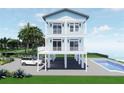 Charming house featuring a private pool and multi-level balconies for optimal outdoor enjoyment at 131 92Nd Ave, Treasure Island, FL 33706