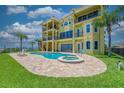 Backyard pool and spa with expansive views of the tranquil bay, ideal for luxurious outdoor living and relaxation at 3236 Gulf Winds Cir, Hernando Beach, FL 34607