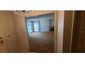Living room with large windows at 3717 Mckay Creek Dr, Largo, FL 33770