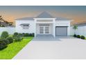 Modern-style home with sleek lines, a well-manicured lawn, and minimalist landscaping at 2010 20Th Avenue Pkwy, Indian Rocks Beach, FL 33785