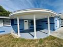 Welcoming covered front porch with decorative columns and a freshly painted surface at 4836 Daphne St, New Port Richey, FL 34652