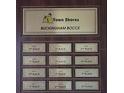 Buckingham Bocce plaque featuring a list of Town Shores Gulfport winners and years at 6060 Shore S Blvd # 903, Gulfport, FL 33707