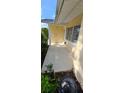 Covered front porch offers a welcoming entrance to this home at 9805 110Th Ln, Seminole, FL 33772